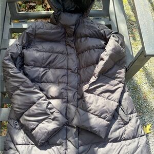 The North Face  Black down fill winter coat women’s xl with minor flaws.